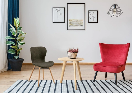 Čalouněná židle Batilda Actona do jídelny a obýváku dubová khaki v boho stylu