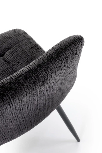 Čalouněná židle Pilew černá do jídelny a obýváku moderní prošívaná na kovových nohách