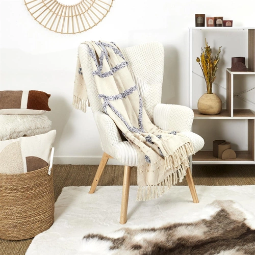 Boho pléd Tuffo krémový s třásněmi na pohovku do obýváku hřejivý a měkký 150x125 cm