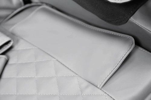 Masážní polohovací křeslo Taya krémová ekokůže s vyhříváním a podnožkou do obýváku