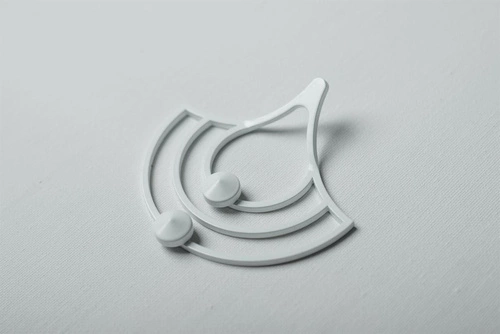 Moderní bílý kovový nástěnný věšák Husk XS POLYHEDRA do předsíně nebo šatny