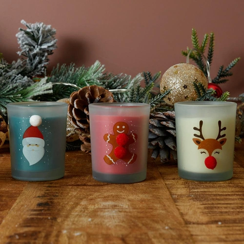 Vánoční vonná svíčka červená s perníčkem Intesi ve skleněném dekorativním obalu