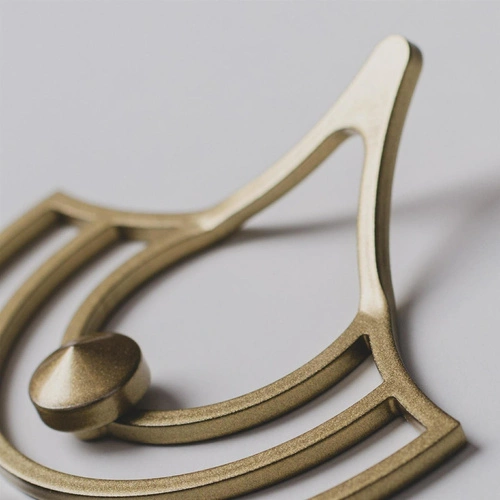 Kovový nástěnný věšák zlatý Husk XS moderní do předsíně a šatny POLYHEDRA