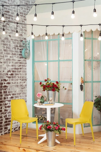 Zahradní žlutá stohovatelná židle z plastu Ginevra moderní na zahradu a terasu SCAB Design