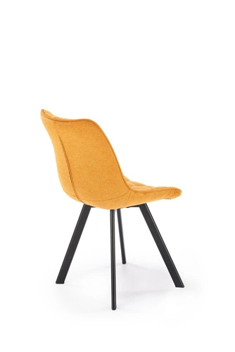 Čalouněná jídelní židle Giselda hořčicová moderní s černými nohami do jídelny a obýváku