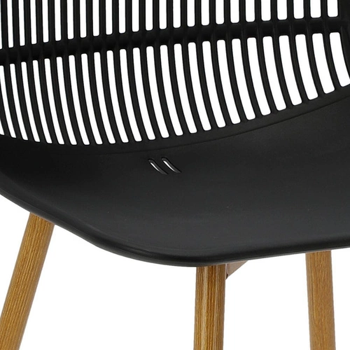 Jídelní židle Klaus Simplet černá plastová s kovovými nohami, vzdušný design