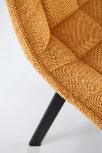 Čalouněná jídelní židle Giselda hořčicová moderní s černými nohami do jídelny a obýváku