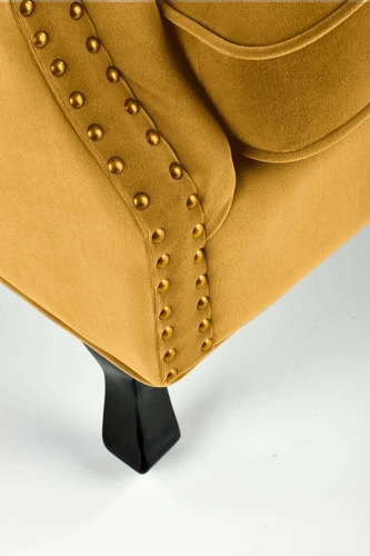 Relaxační křeslo Vader žlutý samet moderní do obýváku na vysokých dřevěných nohách