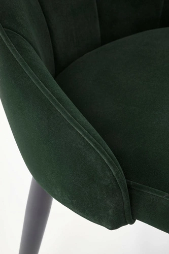 Čalouněná jídelní židle Loyd zelený samet moderní s černými nohami Intesi