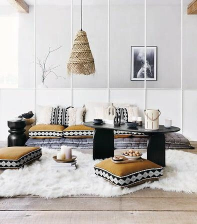 Oválný černý konferenční stolek Isana z mangového dřeva 120x60 cm moderní do obýváku