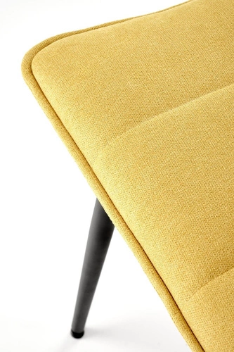 Čalouněná jídelní židle Noelle hořčicová moderní na černých kovových nohách Intesi