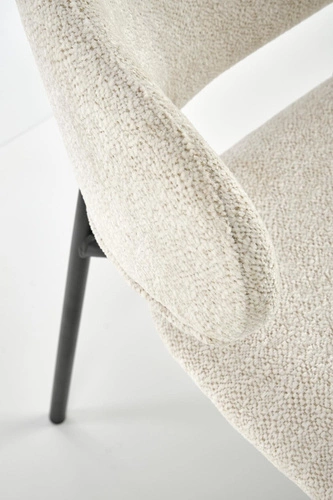 Čalouněná béžová jídelní židle Paupe s černými nohami, moderní do jídelny i obýváku Intesi