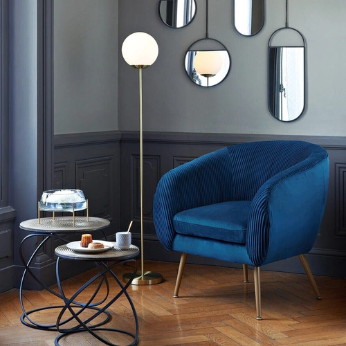 Moderní modré křeslo Solaro z manšestru s područkami do obýváku