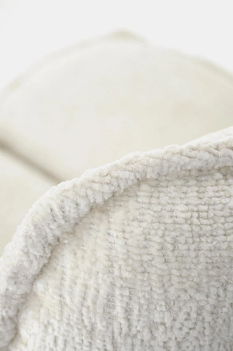 Otočná relaxační křeslo Florens krémová do obýváku moderní látka Intesi