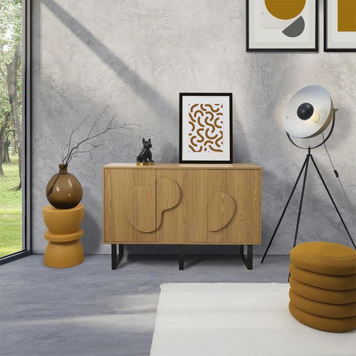 Komoda Calypso dub artisan s dekorativními čely na černých nohách 120 cm do boho obýváku