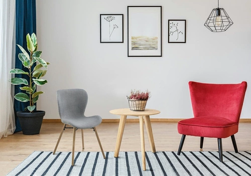 Čalouněná jídelní židle Batilda Actona šedá moderní s dřevěnými nohami