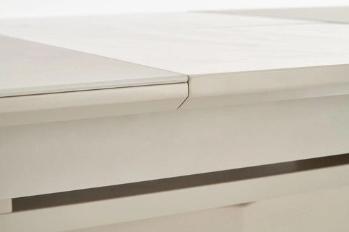 Rozkládací jídelní stůl Retos béžový matný se skleněnou deskou moderní na jedné noze 140-180 cm