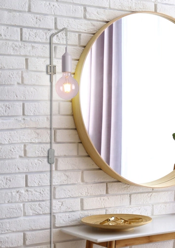 Nástěnné svítidlo Laren bílé moderní kovové do ložnice a obývacího pokoje Ledea