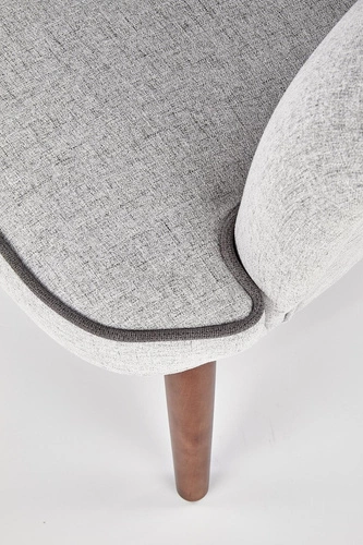 Šedé křeslo ušák Puple do obýváku, skandinávský styl, čalouněné, na dřevěných nohách Intesi