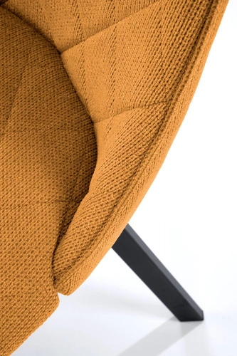 Čalouněná jídelní židle Fenri hořčicová moderní prošívaná s černými nohami Intesi