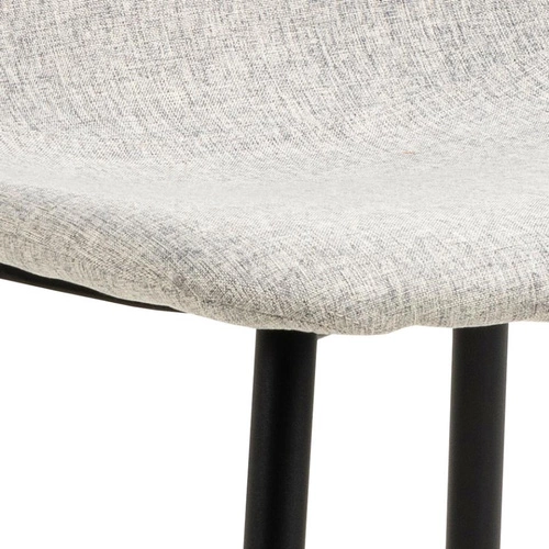 Čalouněná židle Celia šedá do jídelny a kuchyně skandinávský styl na černých nohách Actona