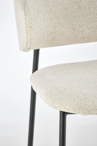 Čalouněná béžová jídelní židle Paupe s černými nohami, moderní do jídelny i obýváku Intesi