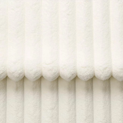 Rozkládací pohovka Loppie s funkcí spaní do obýváku bílý manšestr moderní 257 cm